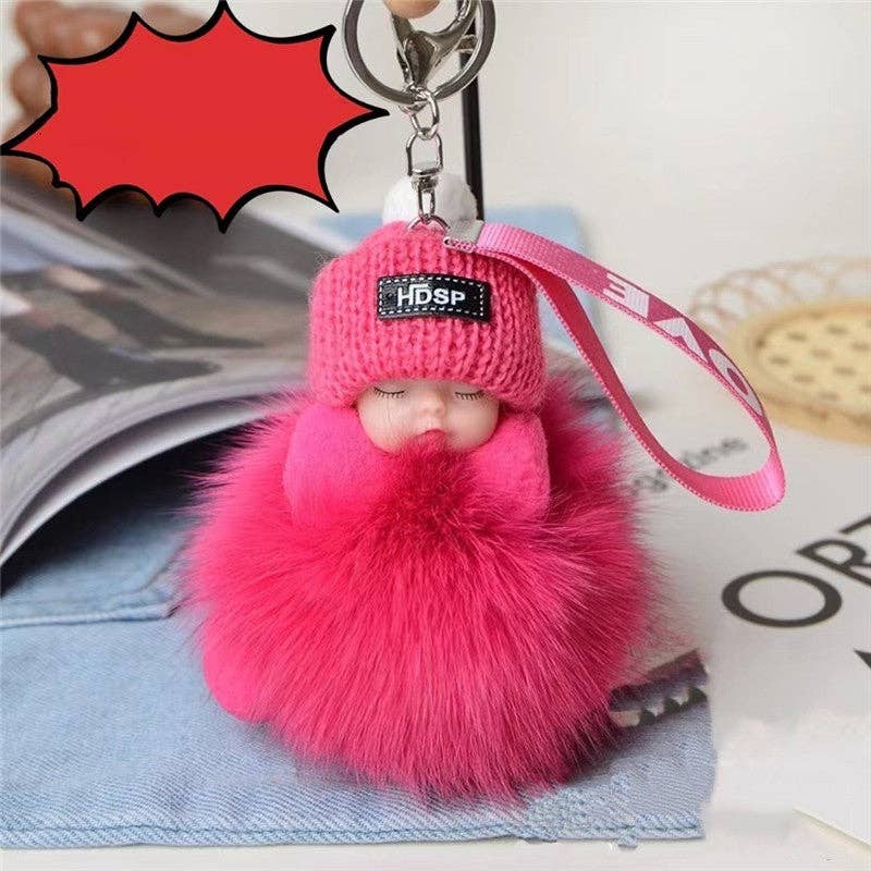 Porte-clés poupée en fourrure endormi