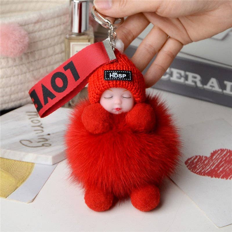 Porte-clés poupée en fourrure endormi