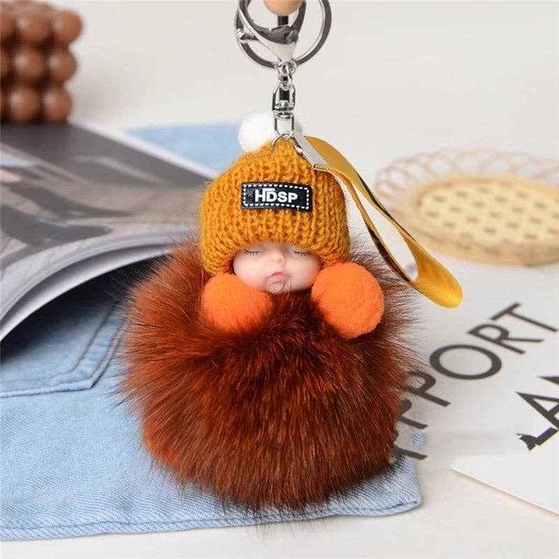 Porte-clés poupée en fourrure endormi