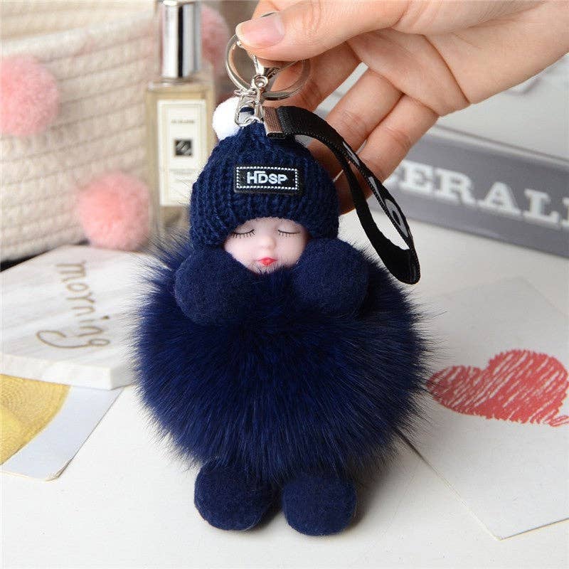Porte-clés poupée en fourrure endormi
