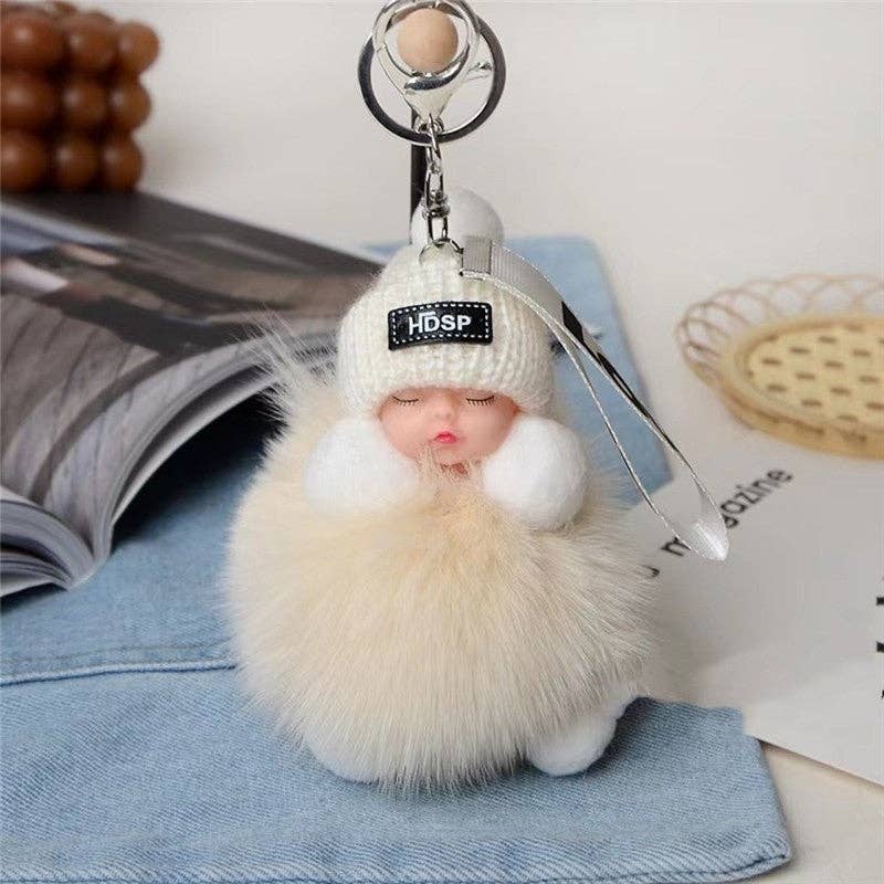 Porte-clés poupée en fourrure endormi